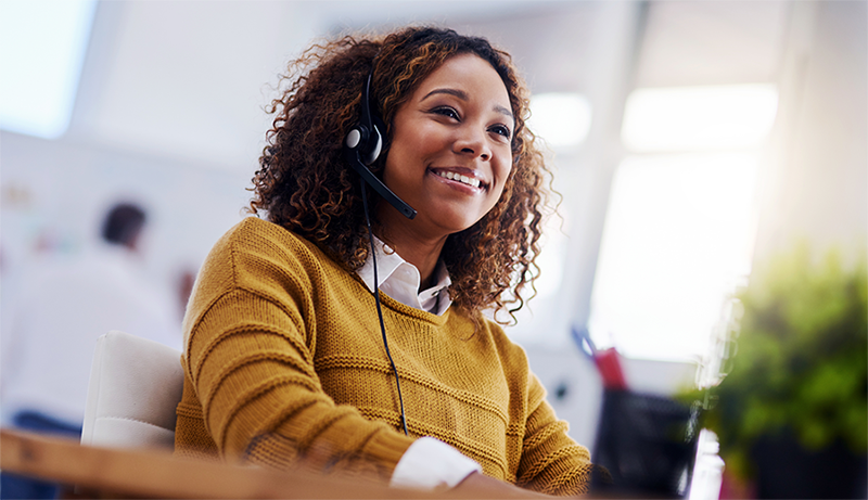 Woman with headset on smiling