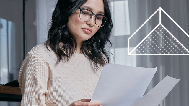 woman looking over her budget