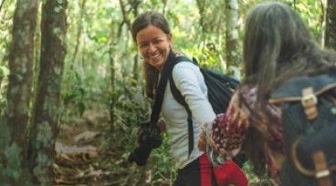 Two women hiking in woods